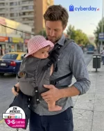 hombre lleva a su bbé en